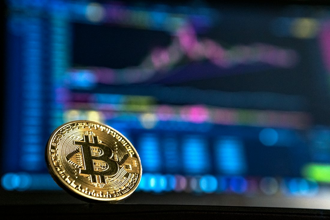 Physical cryptocurrency coins arranged on a surface